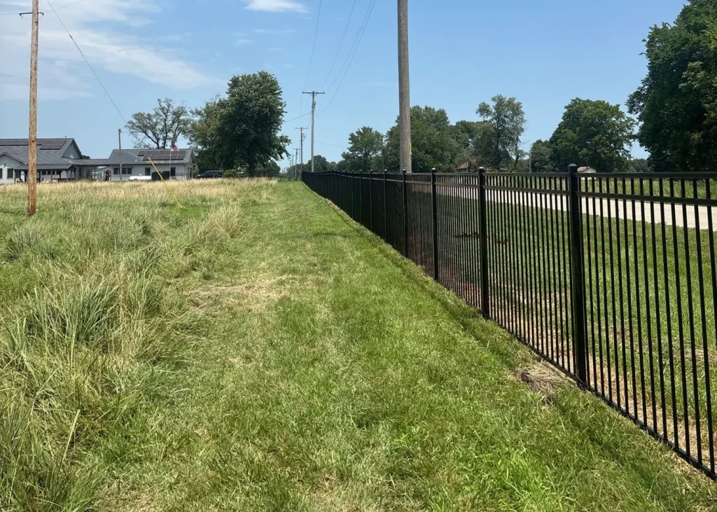 Black steel fence rural property